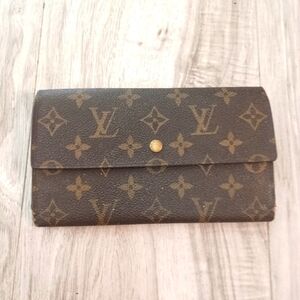 Authentic LOUIS VUITTON Monogram Porte Tresor International Trifold Wallet